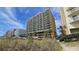 Multi-story building with ocean view and beach access at 501 S Ocean Blvd. # 601, North Myrtle Beach, SC 29582
