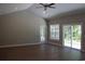 Spacious living room with hardwood floors, vaulted ceiling and sliding glass doors at Tbd 15 Mineral Springs Rd., Conway, SC 29527