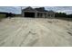 Newly constructed home with a two-car garage and spacious front yard at Tbd 16 Mineral Springs Rd., Conway, SC 29527