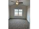 Carpeted bedroom with large window and ceiling fan at Tbd11 Mineral Springs Rd., Conway, SC 29527