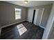 Bright bedroom with dark laminate floors and a window at Tbd20 Casey Dr., Nichols, SC 29581