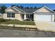 New construction home with attached garage, landscaping, and a neutral color scheme at Tbd20 Casey Dr., Nichols, SC 29581