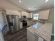 U-shaped kitchen boasting stainless steel appliances and granite countertops at Tbd20 Casey Dr., Nichols, SC 29581