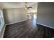 Bright living room featuring dark laminate floors and high ceilings at Tbd20 Casey Dr., Nichols, SC 29581