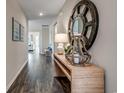 Bright entryway with hardwood floors and decorative console table at Tbd2 Kapalua Loop, Little River, SC 29566