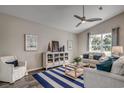 Bright living room features comfy seating, a stylish rug, and large windows at Tbd2 Kapalua Loop, Little River, SC 29566