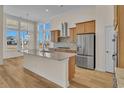 Modern kitchen with stainless steel appliances and island at 1228 Colusa Ct., Little River, SC 29566