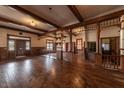 Large living area with hardwood floors and wooden accents at 3215 Bluff Rd., Marion, SC 29571