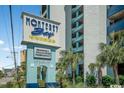 Monterey Bay Suites sign with amenities listed at 6804 N Ocean Blvd. # 1233, Myrtle Beach, SC 29572