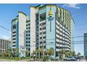 High rise building with parking garage, and ocean view at 6804 N Ocean Blvd. # 1233, Myrtle Beach, SC 29572