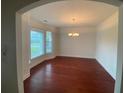 Bright dining room with hardwood floors and bay window at 333 William St., Myrtle Beach, SC 29577
