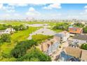 Aerial view of townhomes and marsh; showcasing the property's location and views at 902 Sea Mountain Hwy. # 10, North Myrtle Beach, SC 29582