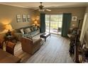 Living Room with access to balcony and neutral decor at 4655 Wild Iris Dr. # 203, Myrtle Beach, SC 29577