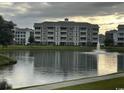 Building exterior with water fountain view at 4843 Luster Leaf Circle # 102, Myrtle Beach, SC 29577