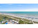 High-angle view of a beautiful beach with umbrellas and people at 1105 S Ocean Blvd. # 528, Myrtle Beach, SC 29577