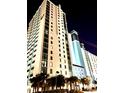 Oceanfront hotel at night, beautifully lit at 3000 N Ocean Blvd. # 132, Myrtle Beach, SC 29577