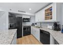 Modern kitchen with granite countertops and appliances at 5523 N Ocean Blvd. # 801, Myrtle Beach, SC 29577