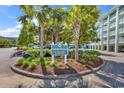 Landscaped entrance to Summerhouse at Litchfield by the Sea at 14290 Ocean Hwy. # 406, Pawleys Island, SC 29585