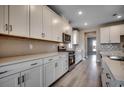 Modern kitchen featuring white cabinets and quartz countertops at 5431 Shelly Lynn Dr., Myrtle Beach, SC 29579