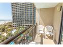 Private balcony with ocean views and seating at 4800 S Ocean Blvd. # 508, North Myrtle Beach, SC 29582