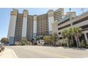 Oceanfront high-rise building with parking area at 4800 S Ocean Blvd. # 809, North Myrtle Beach, SC 29582
