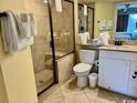 Clean bathroom with shower, toilet, and vanity at 14290 Ocean Highway # 111, Pawleys Island, SC 29585