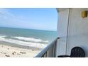 Ocean view from balcony, beach below with people enjoying the sun at 9550 Shore Dr. # 925, Myrtle Beach, SC 29572