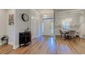 Bright and airy entryway with hardwood floors and dining area at 2500 Suzanne Dr., Conway, SC 29526