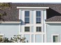 Three-window dormer with white trim and gray roof at 116 Tidal Creek Dr., Murrells Inlet, SC 29576