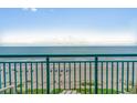 Oceanfront view from balcony with beach and people visible at 2207 S Ocean Blvd. # 1101, Myrtle Beach, SC 29577