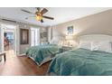 Guest bedroom with two twin beds and ocean views at 210 75Th Ave N # 4091, Myrtle Beach, SC 29572