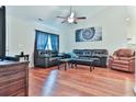 Spacious living room with hardwood floors and ceiling fan at 247 Rolling Oak Dr., Georgetown, SC 29440