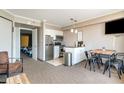 Open kitchen with stainless steel appliances and breakfast bar at 6900 N Ocean Blvd. # 910, Myrtle Beach, SC 29572