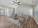 Open living room with wood floors at 1178 Daisy Rd., Loris, SC 29569