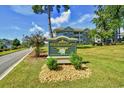 Magnolia Place community entrance sign with landscaping at 4789 Wild Iris Dr. # 203, Myrtle Beach, SC 29577