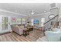 Living room with comfy seating, hardwood floors, and a flat-screen TV at 6001- Mh12B S Kings Hwy., Myrtle Beach, SC 29575