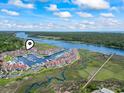 Aerial view of waterfront community with marina and boat slips at 4396 Baldwin Ave. # 109, Little River, SC 29566
