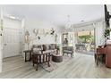Living Room with access to patio and neutral decor at 242 Sun Colony Blvd. # 101, Longs, SC 29568