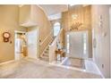 Bright and spacious entryway with high ceilings and staircase at 2513 Hunters Trail, Myrtle Beach, SC 29588