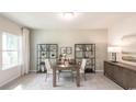 Bright home office with built-in shelving and large window at 7089 Watercress St, Myrtle Beach, SC 29579