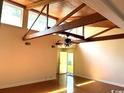 Living room with high ceilings, hardwood floors, and exposed beams at 150 Wedgefield Village Rd. # 24, Georgetown, SC 29440