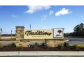 Traditions community sign in Myrtle Beach, SC at 614 Castle Ct., Myrtle Beach, SC 29579
