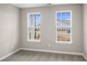 Bright bedroom with neutral walls and carpet flooring at 297 Broughton Dr., Myrtle Beach, SC 29579