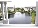 Community features a pond with fountain and manicured landscaping at 3792 Hitchcock Way # 238, Myrtle Beach, SC 29577