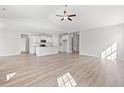 Open concept kitchen with white cabinets and granite countertops at 1133 Cypress Shoal Dr., Conway, SC 29526