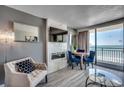 Living room with ocean view, fireplace, and seating area at 1105 S Ocean Blvd. # 720, Myrtle Beach, SC 29577