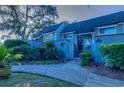 Exterior view of a charming blue duplex at 117 Finch Dr. # 272, Georgetown, SC 29440