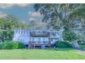 Rear view of a two-story home with multiple decks at 117 Finch Dr. # 272, Georgetown, SC 29440