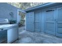 Exterior storage area with a grill and multiple storage units at 117 Finch Dr. # 272, Georgetown, SC 29440