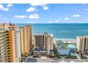 Aerial view of beachfront condo building, showcasing oceanfront location and surrounding buildings at 501 S Ocean Blvd. # 308, North Myrtle Beach, SC 29582